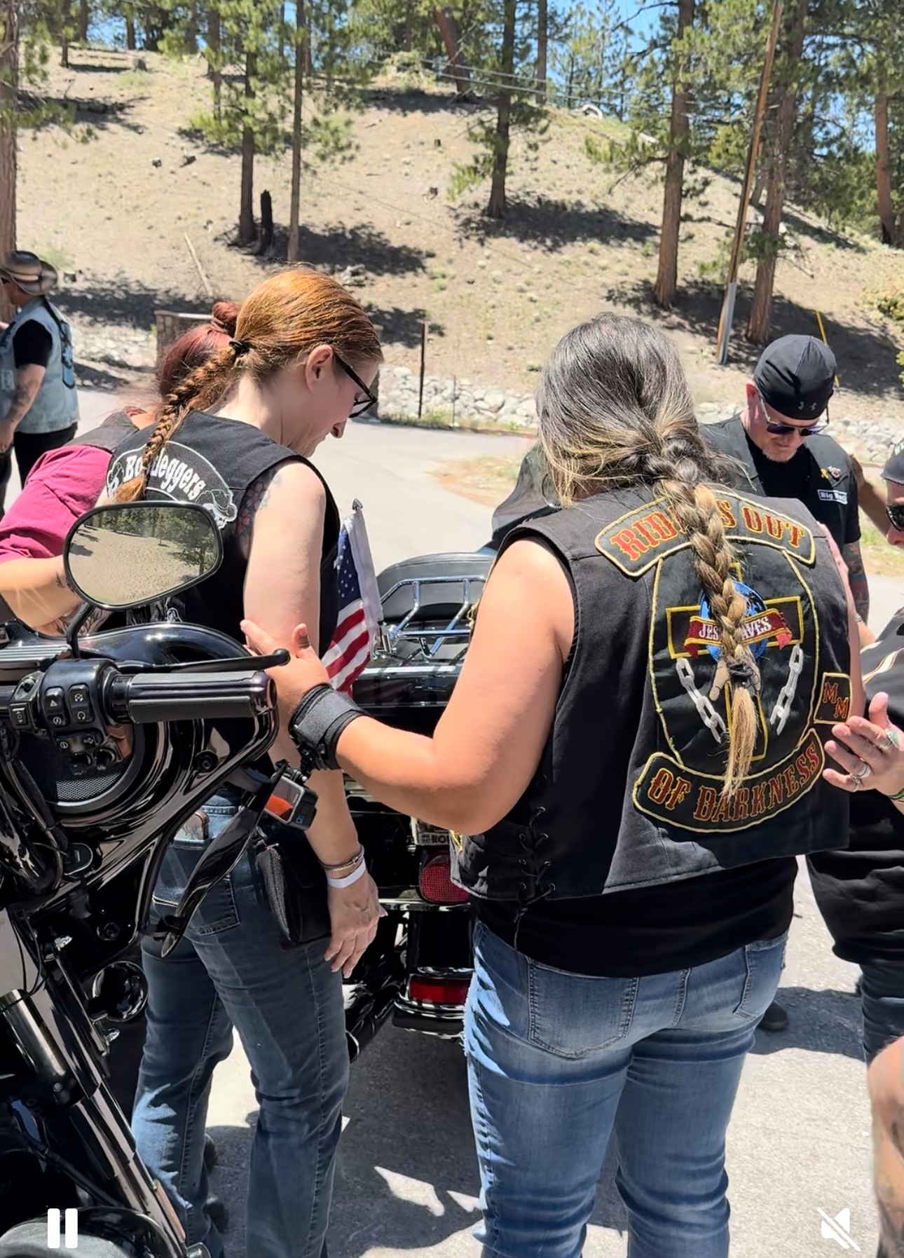 Riders Out of Darkness member in prayer
